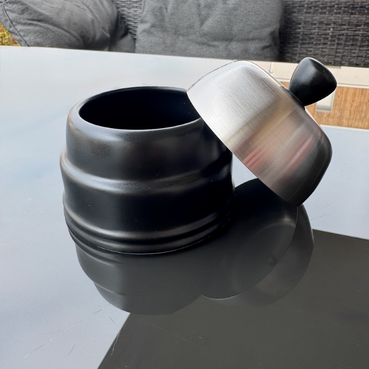 Matte black ceramic sugar bowl with brushed stainless steel dome lid, elegant French design from the Salam collection by Degrenne.