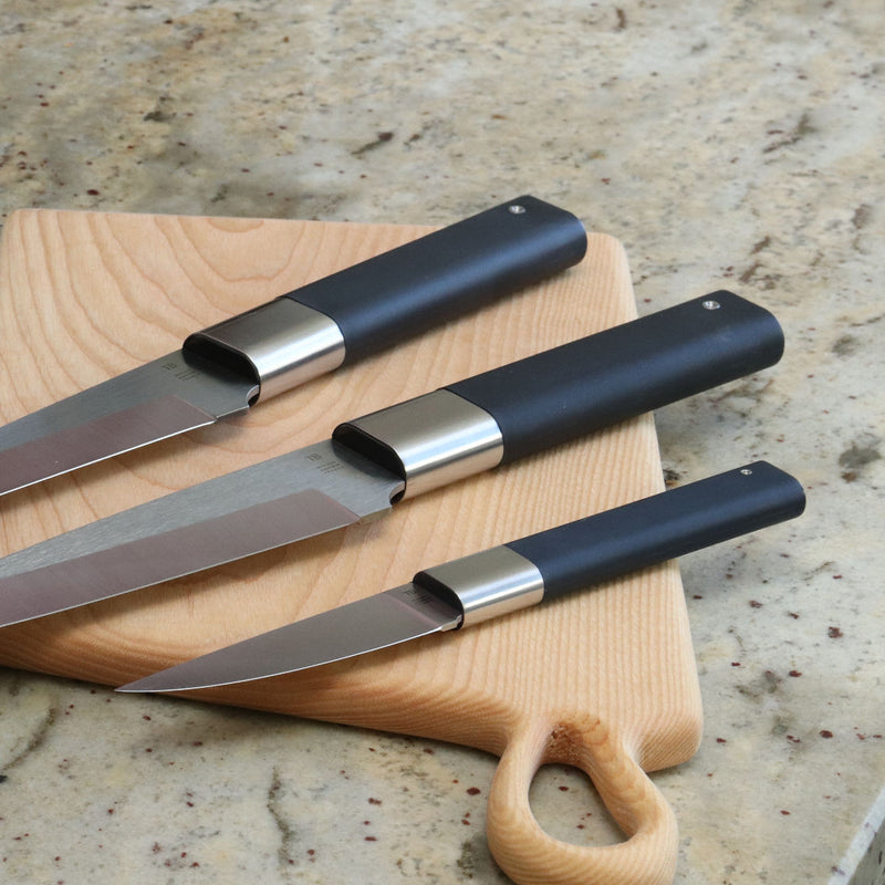 Chef knife set 3 pieces ABSOLU by Tarrerias-Bonjean on a cutting board