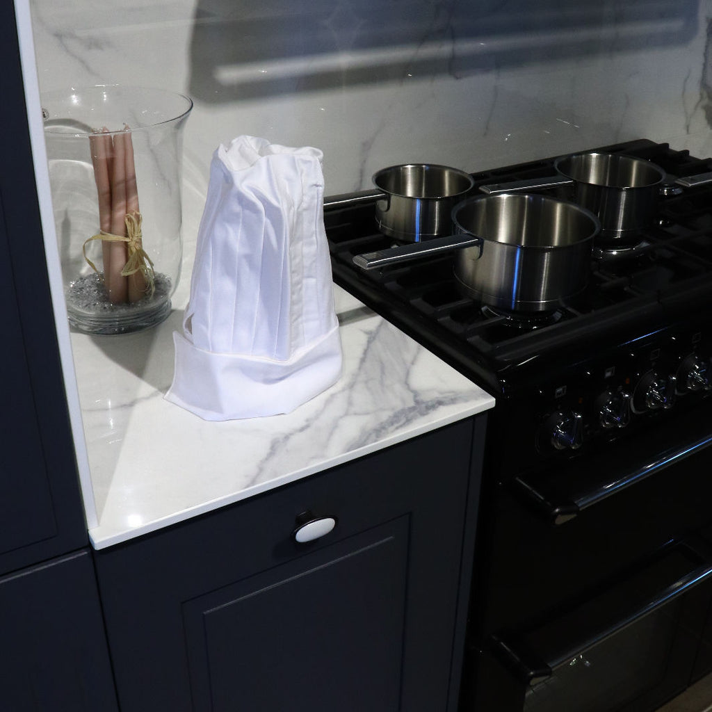 Grand Chef Hat in Marble Kitchen