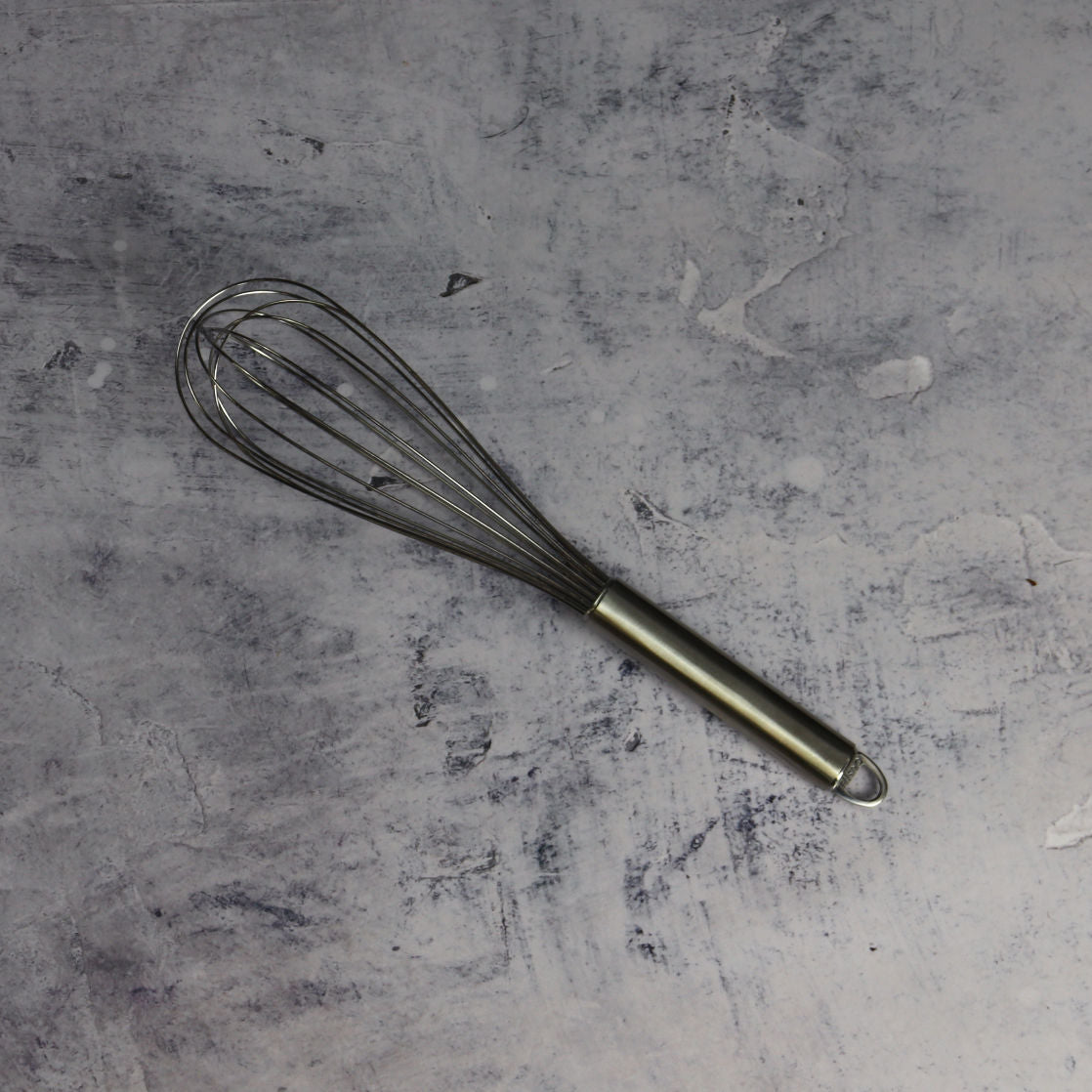 Classic 30cm whisk on marble desk