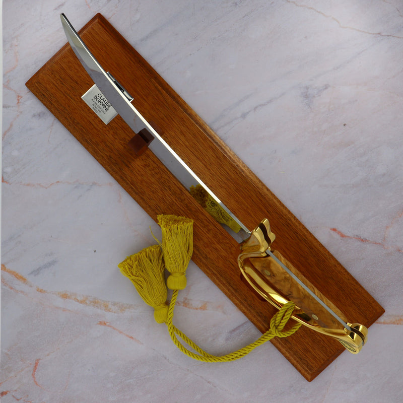 Napoleon Champagne saber olive wood handle on wooden display stand